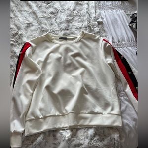 White light shirt, red and blue stripe, gold accent